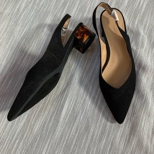 New black pumps with tortoise shell heels